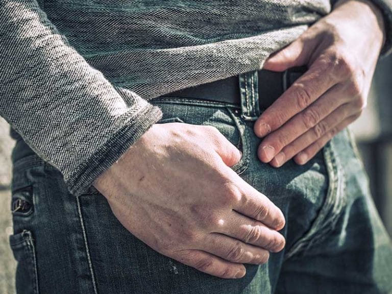 8 Reasons Why Guys Adjust Themselves in Front of You